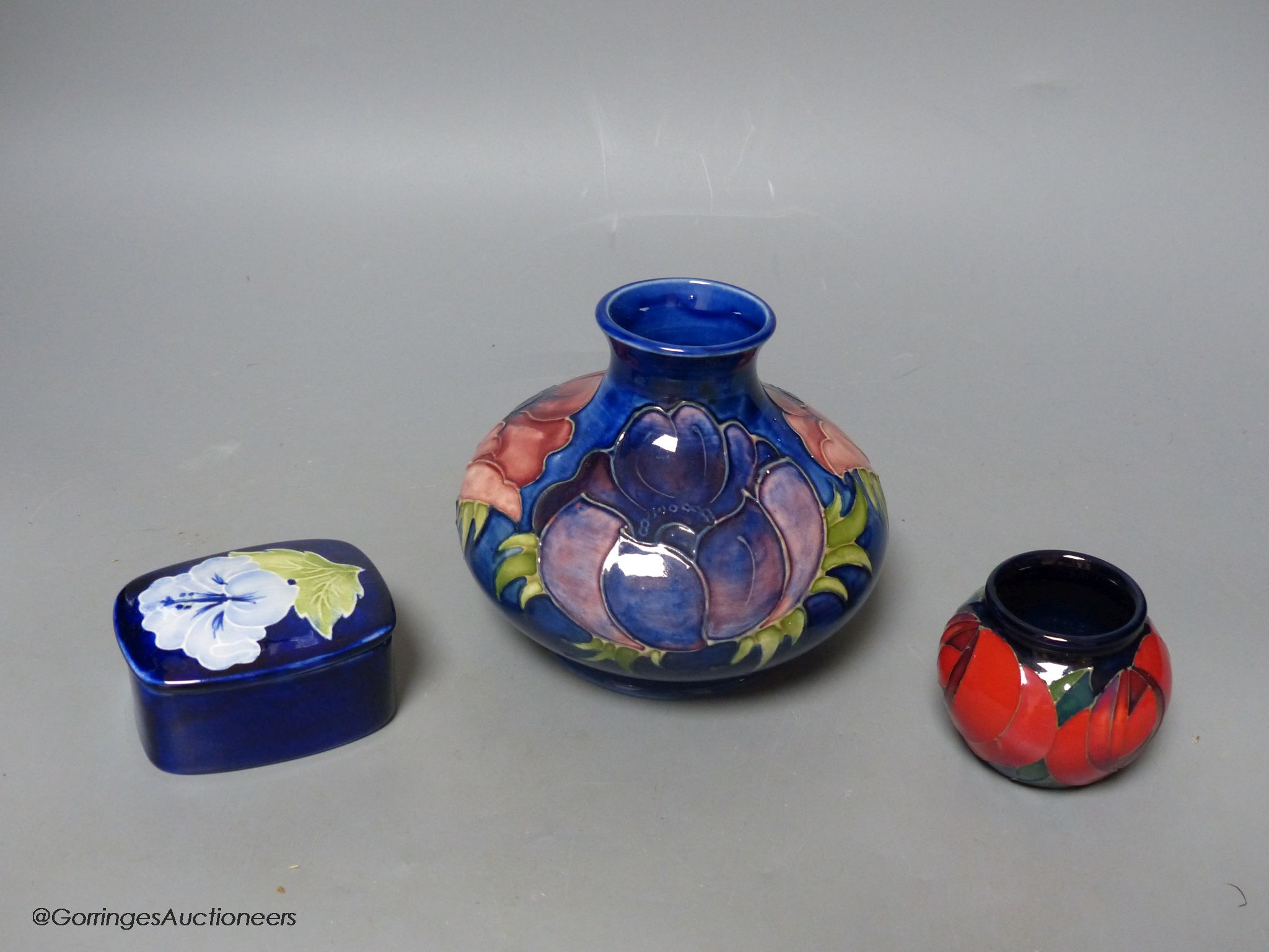 Two Moorcroft pottery vases and a lidded box (3)